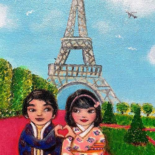 Joolie Green is the owner and creator of JOYJOart + design, painting romantic kokeshi travel couples.